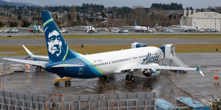 An Alaska Airlines Boeing 737 MAX 9 is seen at Renton Municipal Airport adjacent to Boeing's factory in Renton, Washington, on Thursday.