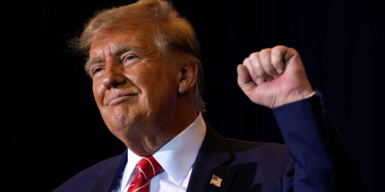 Republican presidential candidate former President Donald Trump gestures after speaking at a campaign event Friday in Concord, New Hampshire.