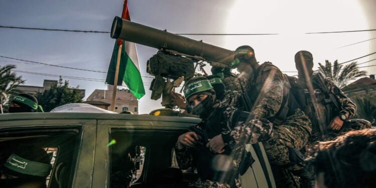 Hamas militants parade at a rally in Gaza in October during a cease-fire in the war between Hamas and Israel.