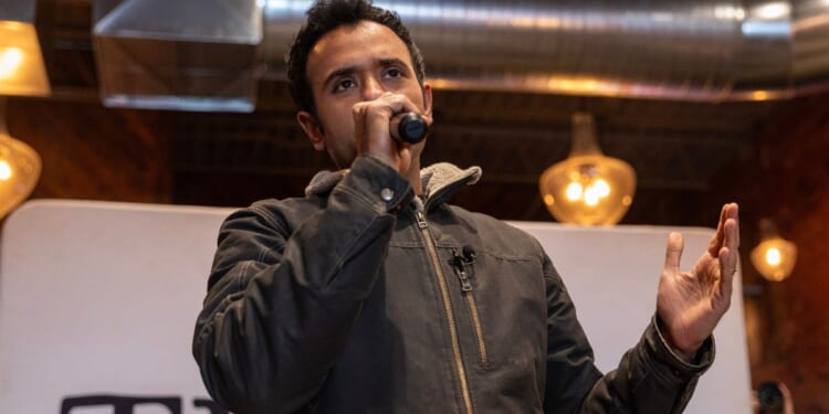 Then-Republican presidential hopeful Vivek Ramaswamy speaks to attendees during a campaign stop in Ames, Iowa, on Sunday.