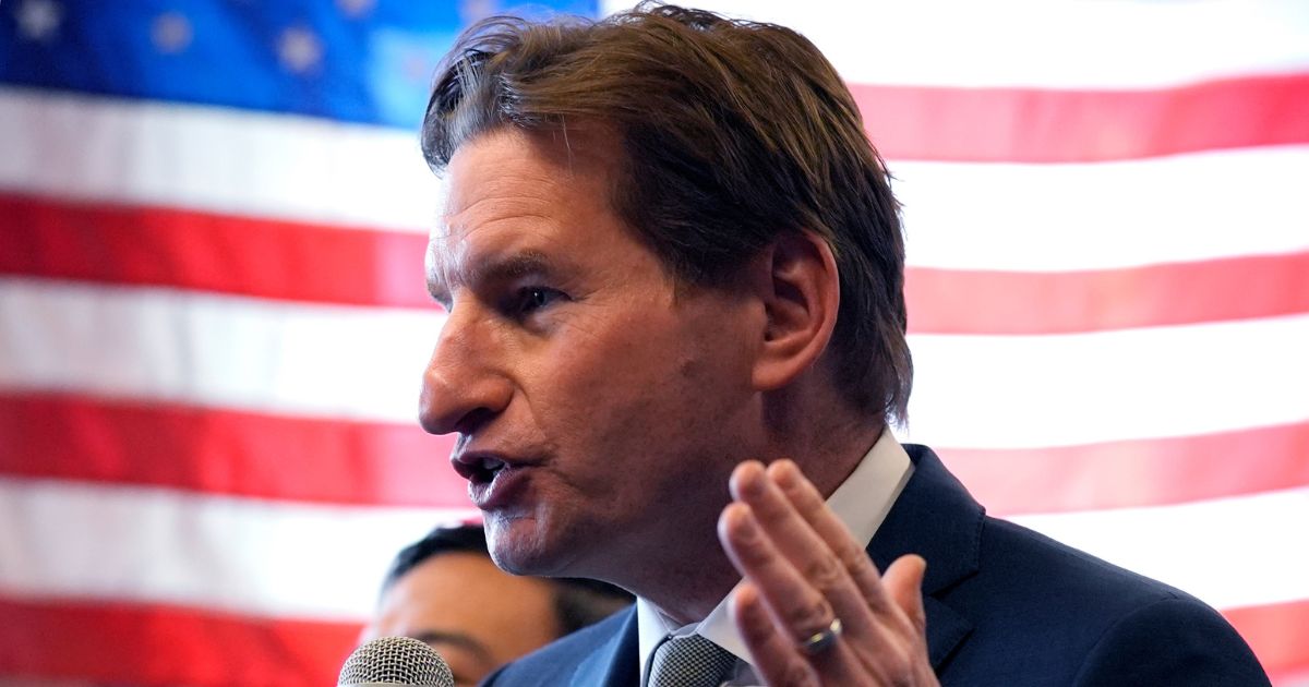 Democratic presidential candidate Rep. Dean Phillips of Minnesota gestures during a campaign stop in Manchester, New Hampshire, on Thursday.