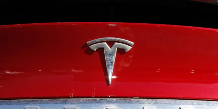 Tesla recals nearly 2.2M vehicles for software update to fix warning lights that are too small