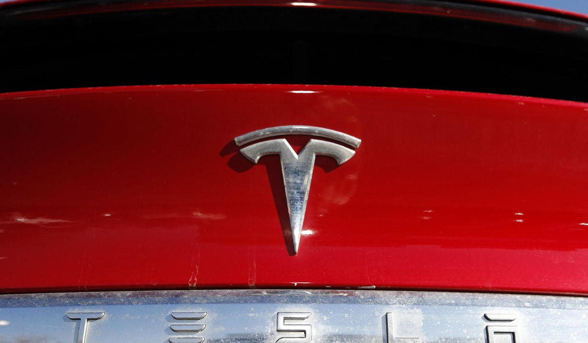 Tesla recals nearly 2.2M vehicles for software update to fix warning lights that are too small