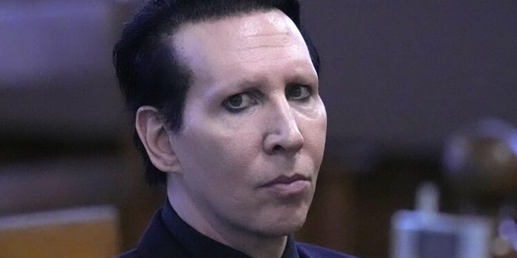 Manson completes community service sentence for blowing nose on videographer