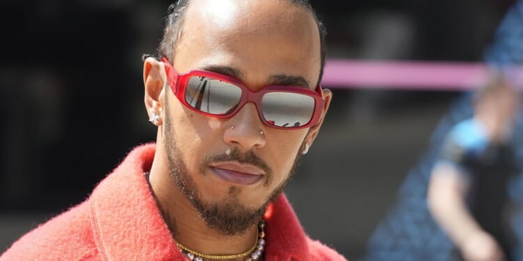 Formula One champion Lewis Hamilton says driving for Ferrari will be a 'childhood dream' come true