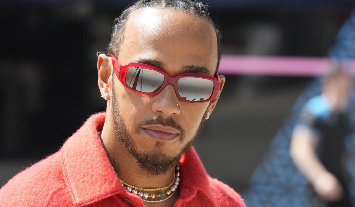 Formula One champion Lewis Hamilton says driving for Ferrari will be a 'childhood dream' come true