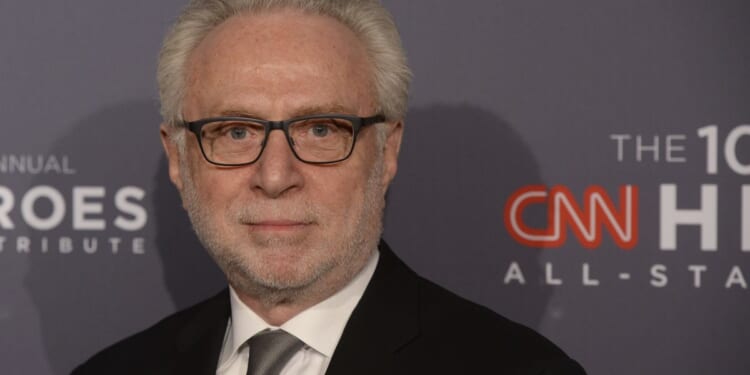 Wolf Blitzer looks sick on air, then vomiting heard in CNN live broadcast