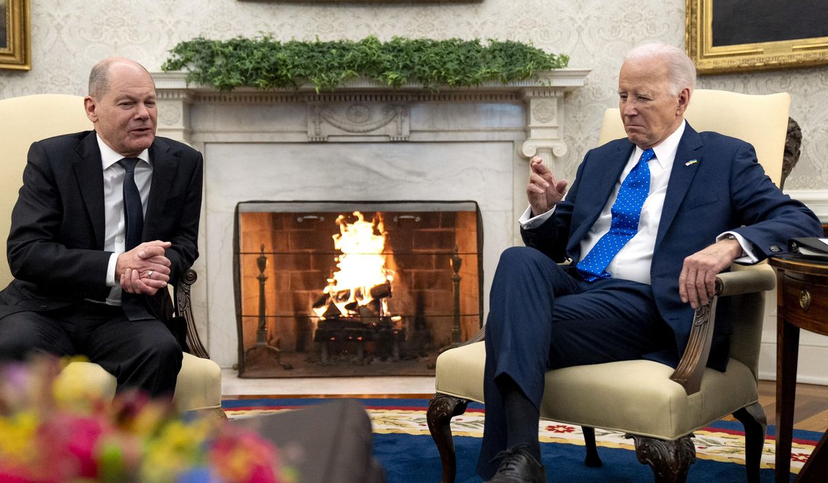 Biden says GOP holdup of Ukraine aid 'close to criminal neglect' as he meets with Germany's Scholz