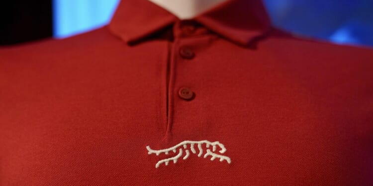 Tiger Woods unveils Sun Day Red, a new apparel brand with TaylorMade. Here's what it means