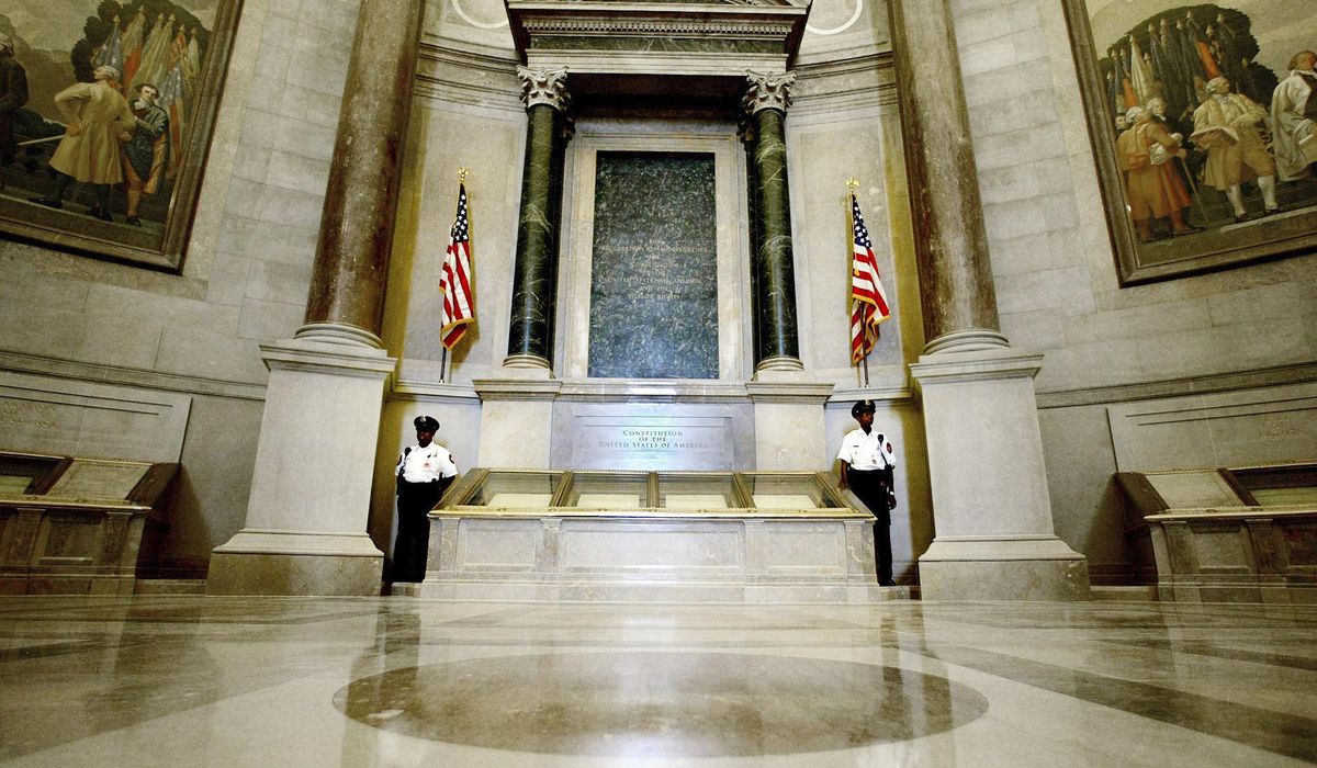 Climate activists arrested for dumping red powder on U.S. Constitution display at National Archives