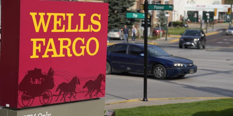 U.S. eases restrictions on Wells Fargo after years of strict oversight following scandal