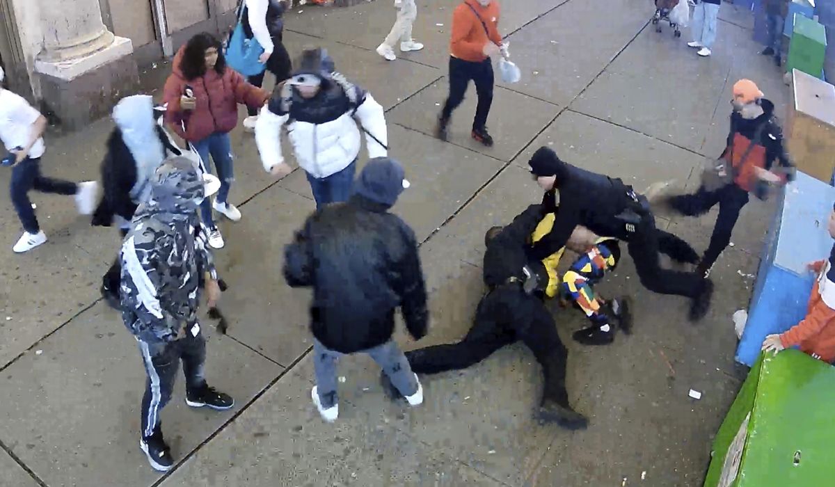 Billboard depicting the migrant attack on police goes up in Times Square