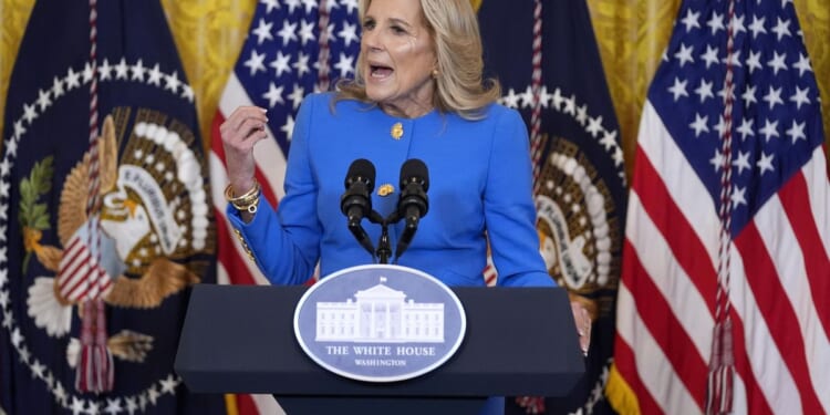 First lady Jill Biden implores an 'often mired in gridlock' Congress to follow governors' lead