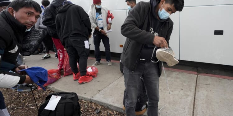 Border Patrol releases hundreds of migrants at a bus stop after San Diego runs out of aid money