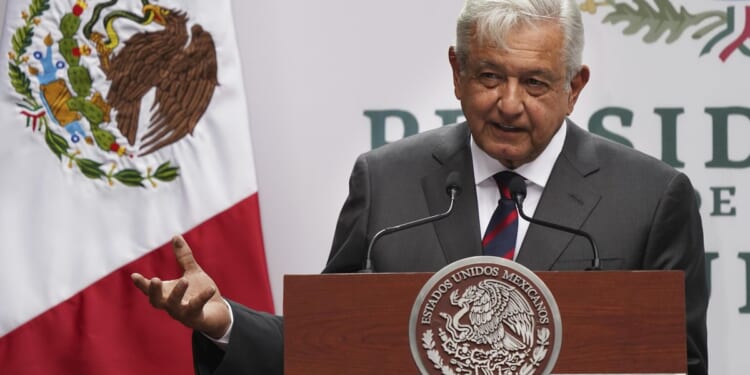 Mexico's president defends disclosing reporter's phone number, saying the law doesn't apply to him