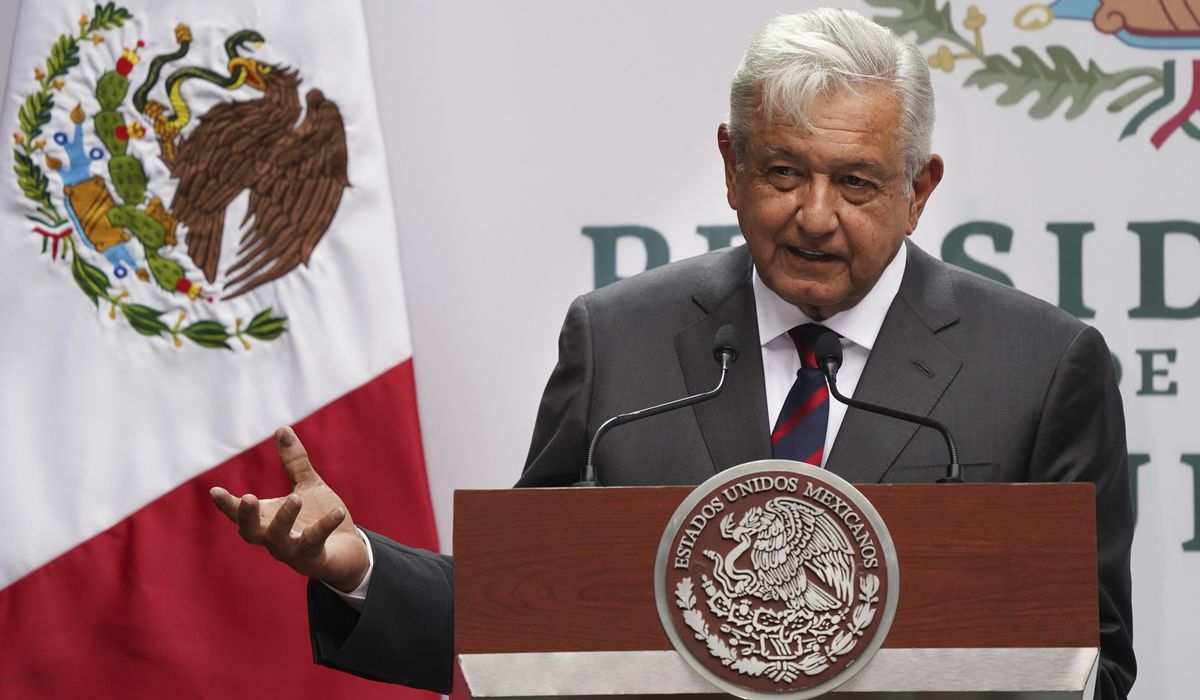 Mexico's president defends disclosing reporter's phone number, saying the law doesn't apply to him