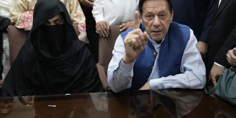 Pakistan's ex-PM Imran Khan and his wife appear in court and plead not guilty in another graft case