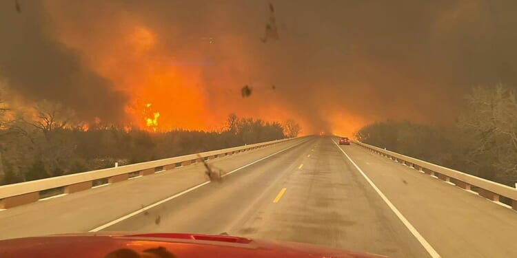 Wildfire grows into one of largest in Texas history as flames menace multiple small towns