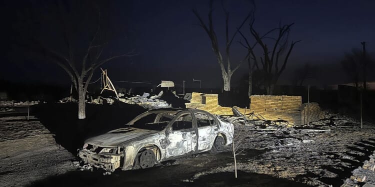 Charred homes, blackened earth after Texas town revisited by destructive wildfire 10 years later