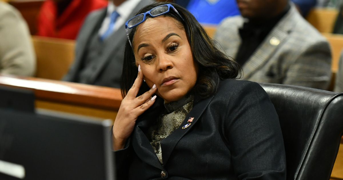 Fulton County District Attorney Fani Willis appears before Judge Scott McAfee for a hearing in the 2020 Georgia election interference case at the Fulton County Courthouse in Atlanta, Georgia, on Nov. 21.