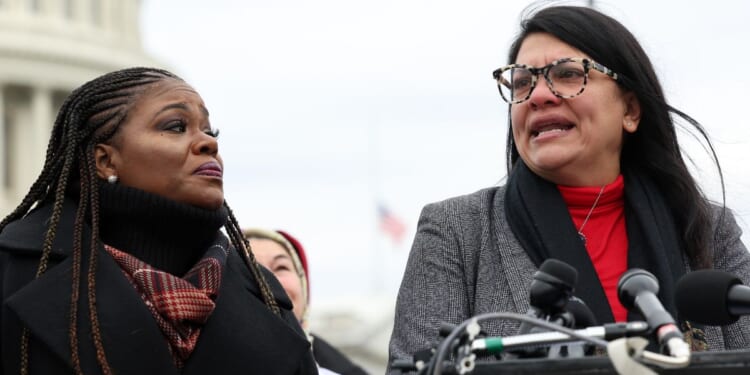 Democratic Reps. Cori Bush, left, and Rashida Tlaib speak at a news conference on the Israel-Hamas war outside of the U.S. Capitol in Washington on Dec. 7.