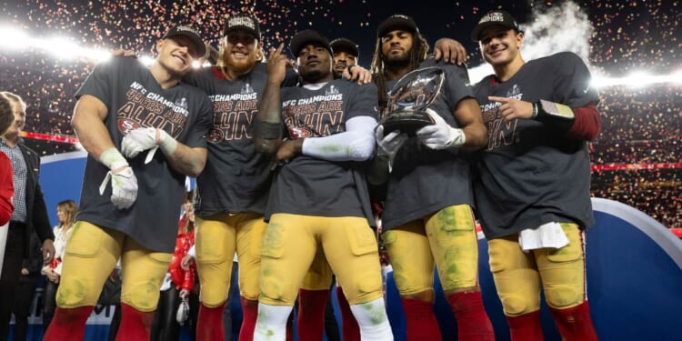 From left, Christian McCaffrey, George Kittle, Deebo Samuel, Trent Williams, Fred Warner and Brock Purdy of the San Francisco 49ers celebrate their victory over the Detroit Lions in the NFC championship game at Levi's Stadium in Santa Clara, California, on Jan. 28.