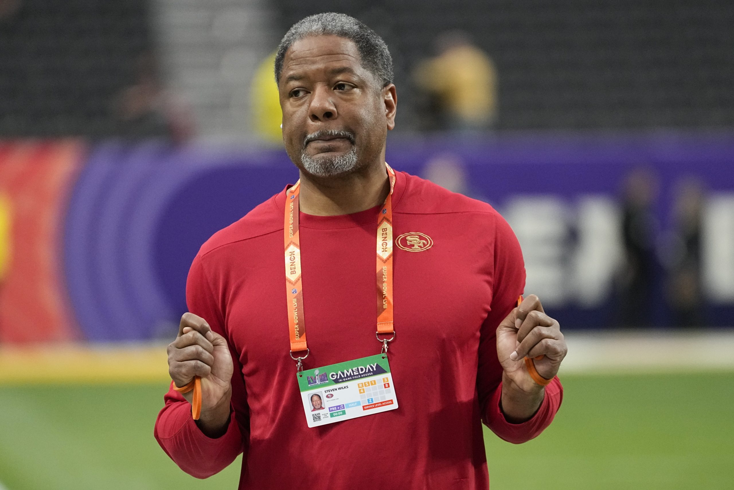 San Francisco 49ers then-defensive coordinator Steve Wilks walks onto the field before Super Bowl LVIII in Las Vegas, Nevada, on Sunday.