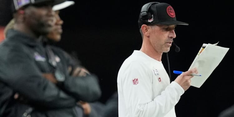 San Francisco 49ers head coach Kyle Shanahan looks at notes during the second half of the Super Bowl against the Kansas City Chiefs on Sunday in Las Vegas.