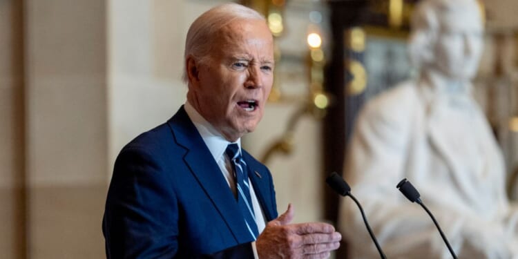 President Joe Biden speaks at the National Prayer Breakfast in Statuary Hall, Thursday, in Washington, D.C.