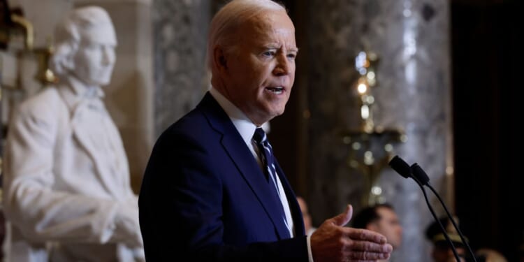 President Joe Biden addresses the annual National Prayer Breakfast in Statuary Hall in the U.S. Capitol in Washington on Thursday.