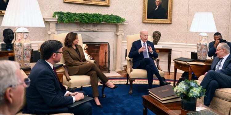 President Joe Biden and Vice President Kamala Harris are seen at Tuesday's White House meeting with Senate Minority Leader Mitch McConnell of Kentucky, left, House Speaker Mike Johnson of Louisiana, and Senate Majority Leader Chuck Schumer of New York, right. Also attending was House Minority Leader Hakeem Jeffries of New York.