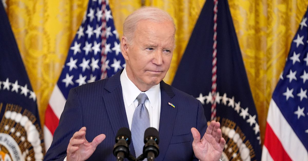 Joe Biden speaking in the East Room of the White House