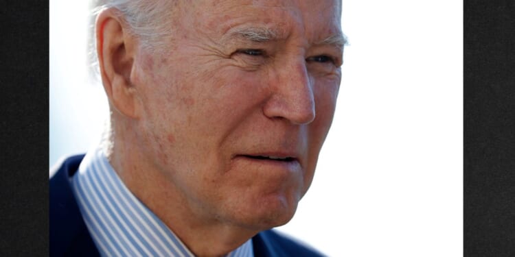 President Joe Biden talks with reporters after returning to the White House on Feb.19 after spending the weekend in Delaware.