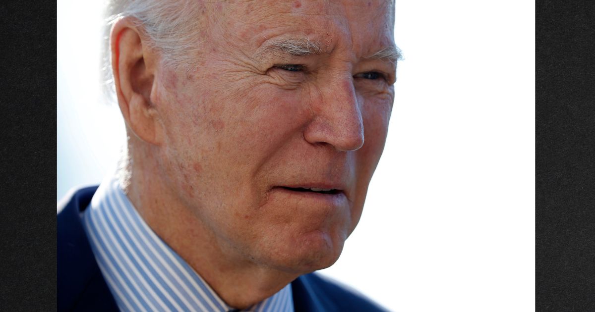 President Joe Biden talks with reporters after returning to the White House on Feb.19 after spending the weekend in Delaware.