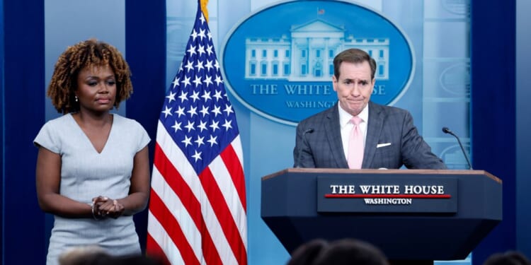 White House press secretary Karine Jean-Pierre, left, looks on while John Kirby, White House national security communications adviser, speak during a daily news briefing at the James S. Brady Press Briefing Room of the White House in Washington on Tuesday.