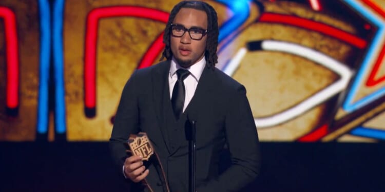 C.J. Stroud of the Houston Texans accepts the Offensive Rookie of the Year award.