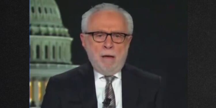 CNN's Wolf Blitzer appeared unwell before his segment was abruptly halted Thursday.