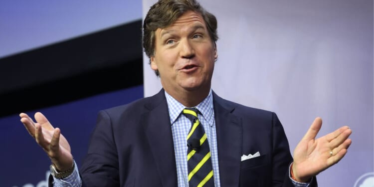 Tucker Carlson speaks to guests at the Family Leadership Summit in Des Moines, Iowa, on July 14.