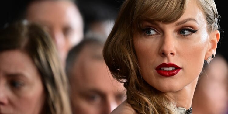 Pop star Taylor Swift arrives for the 66th Annual Grammy Awards at the Crypto.com Arena in Los Angeles on Sunday.