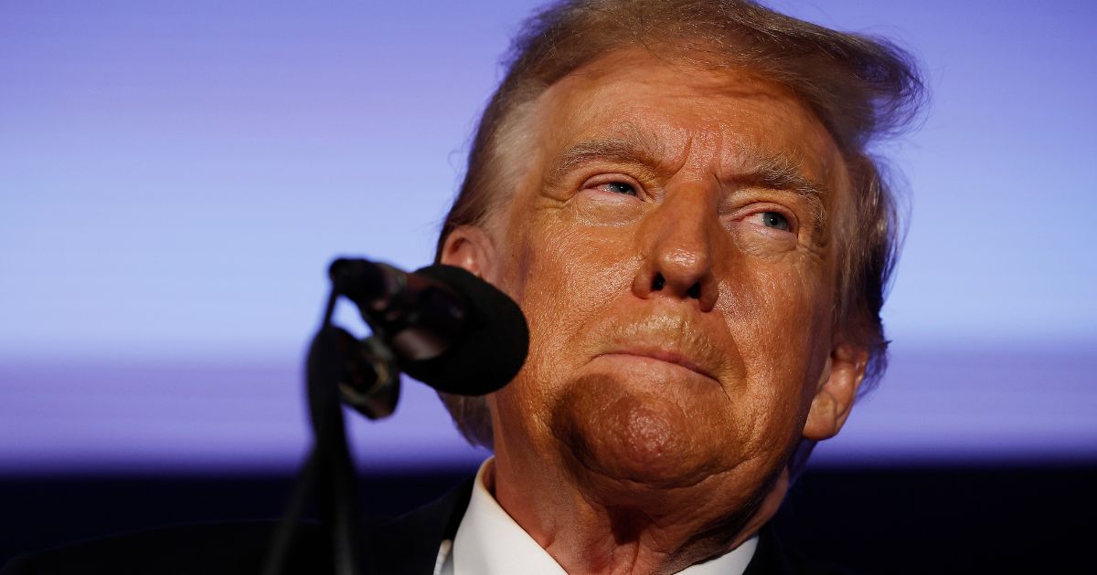 Republican presidential candidate and former President Donald Trump talks to supporters during a campaign rally at the Sheraton Portsmouth Harborside Hotel in Portsmouth, New Hampshire, on Jan. 17.