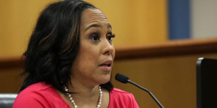 Fulton County District Attorney Fani Willis testifies during a hearing in the case of the State of Georgia v. Donald Trump at the Fulton County Courthouse in Atlanta on Thursday.