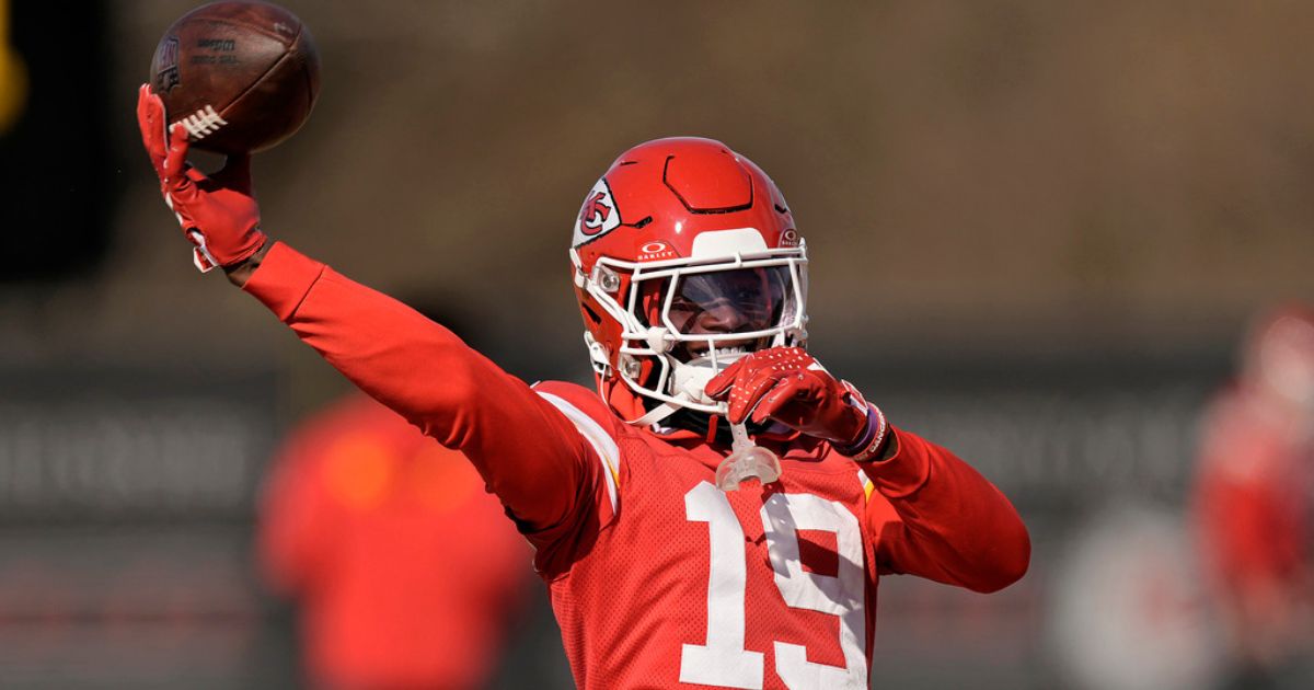 Kansas City Chiefs wide receiver Kadarius Toney passes the ball during the team's NFL football practice Feb. 2, in Kansas City, Missouri.