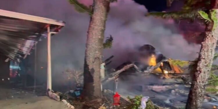 A small plane crashed into a senior living community Friday in Clearwater, Florida, striking a mobile home before bursting into flames. .