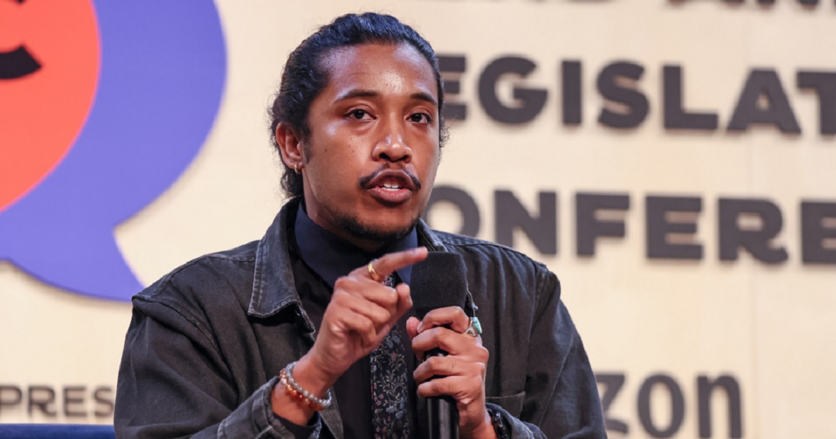 Tennessee state Rep. holds a microphone in a file photo from September 2023 at a "national town hall" in Washington.