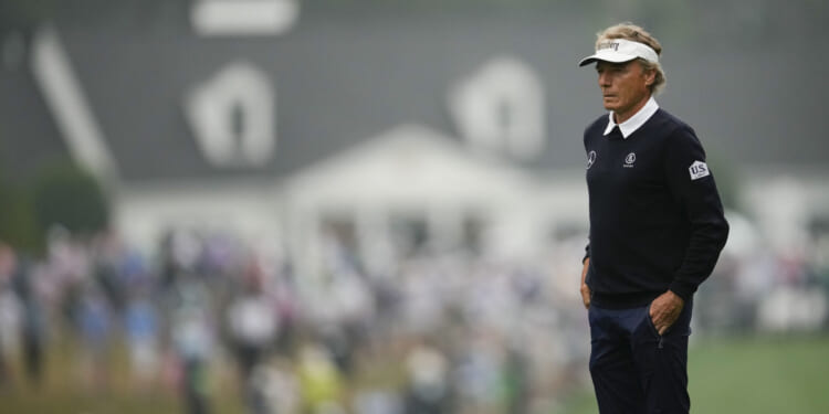 Bernhard Langer, of Germany, waits to hit on the first hole during the second round of the Masters golf tournament at Augusta National Golf Club on April 7, 2023, in Augusta, Georgia.