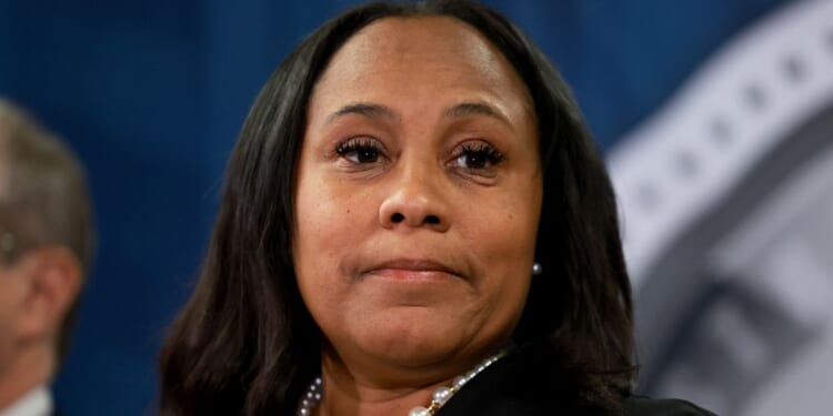 Fulton County, Georgia, District Attorney Fani Willis speaks during a news conference at the Fulton County Government building in Atlanta on Aug. 14.