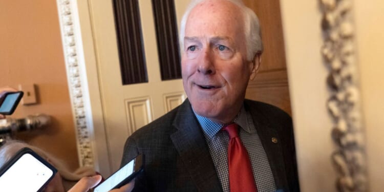 Sen. John Cornyn, R-Texas, speaks to reporters Wednesday after Senate Minority Leader Mitch McConnell, of Kentucky, announced he will step down as Senate Republican leader in November.