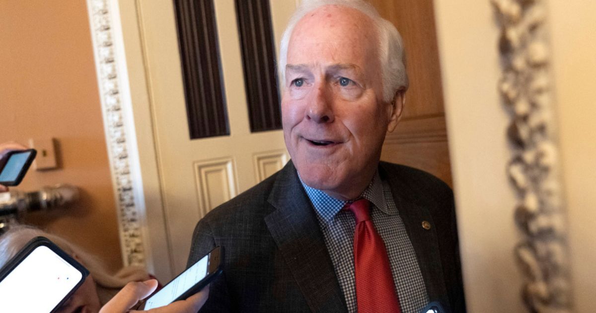 Sen. John Cornyn, R-Texas, speaks to reporters Wednesday after Senate Minority Leader Mitch McConnell, of Kentucky, announced he will step down as Senate Republican leader in November.