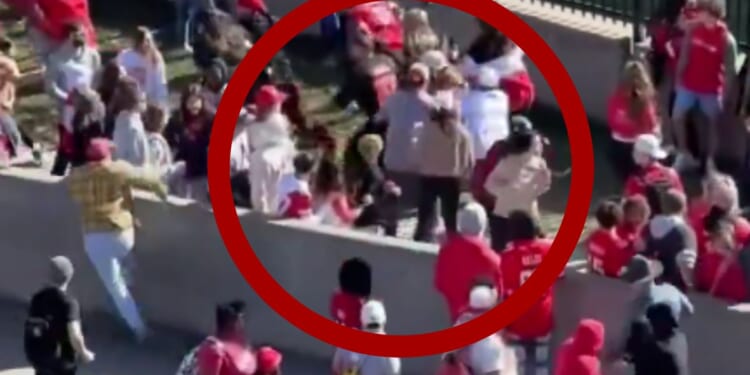 New video footage appears to show Kansas City Chiefs fans chasing down a suspect following a shooting at the end of the Super Bowl parade in Kansas City, Missouri, on Wednesday.