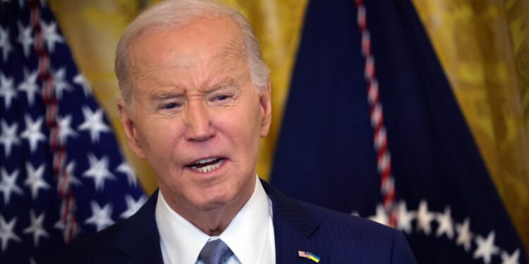 President Joe Biden speaks to governors in the East Room of the White House in Washington on Friday.